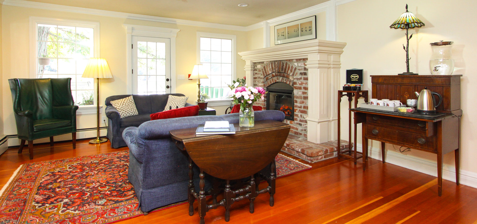 living room with couch table and fireplace