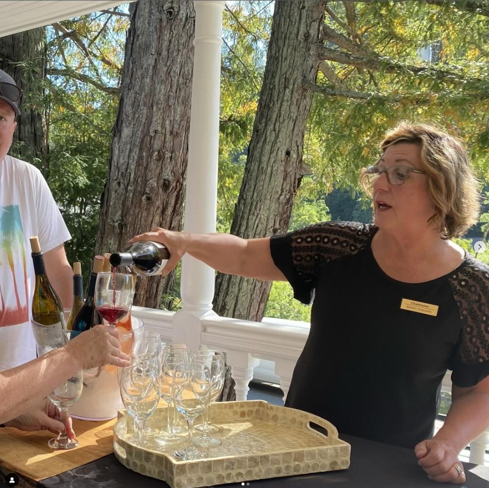 Guests enjoying wine tasting on The Inn at Occidental’s veranda in Wine Country